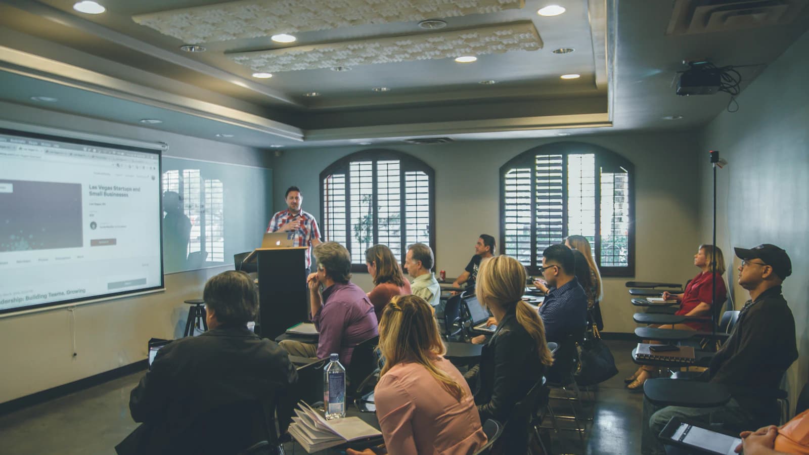 Team members engaged in hands-on AI tool training workshop