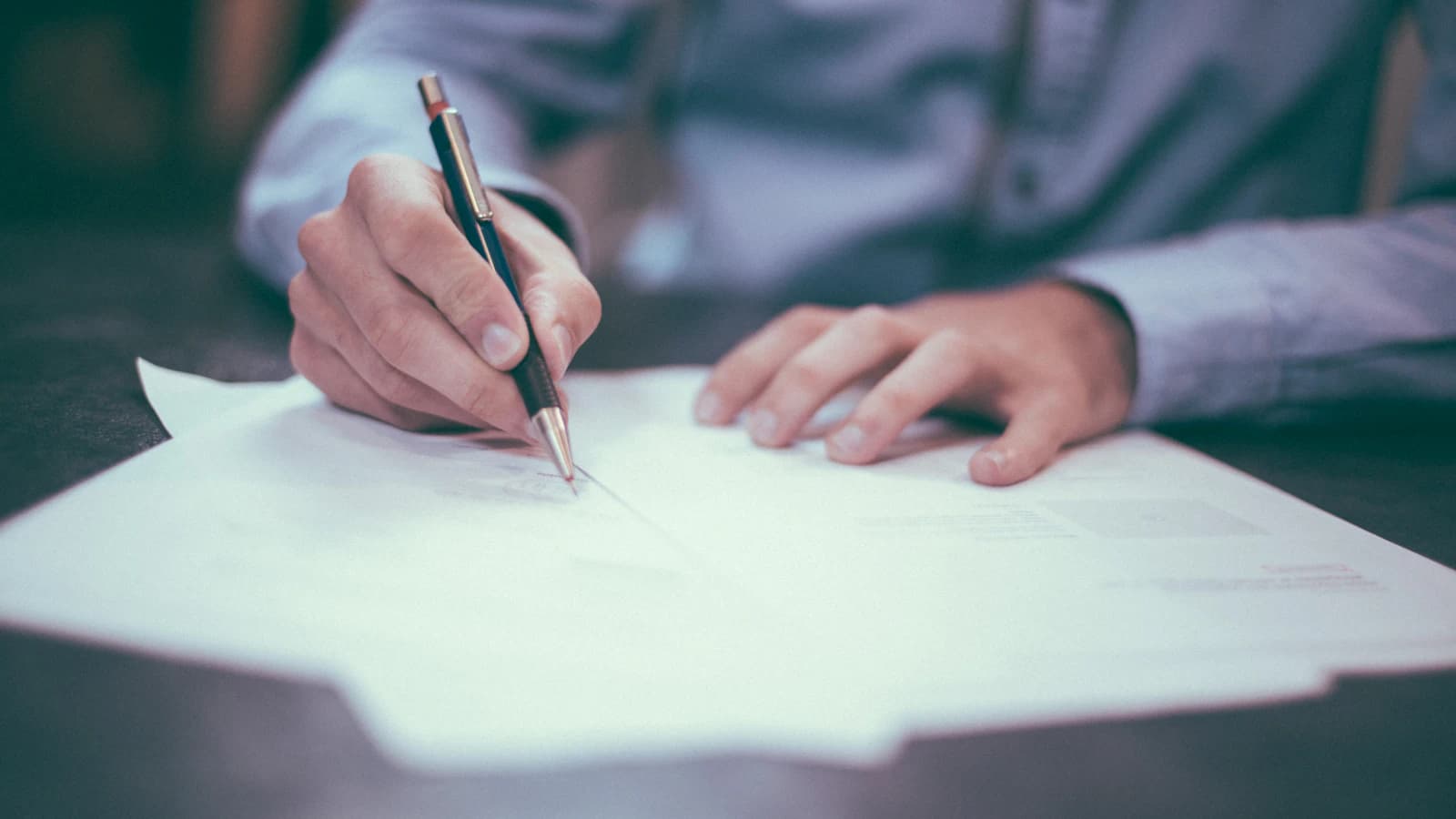 Documents being processed through an AI system that extracts and classifies data automatically